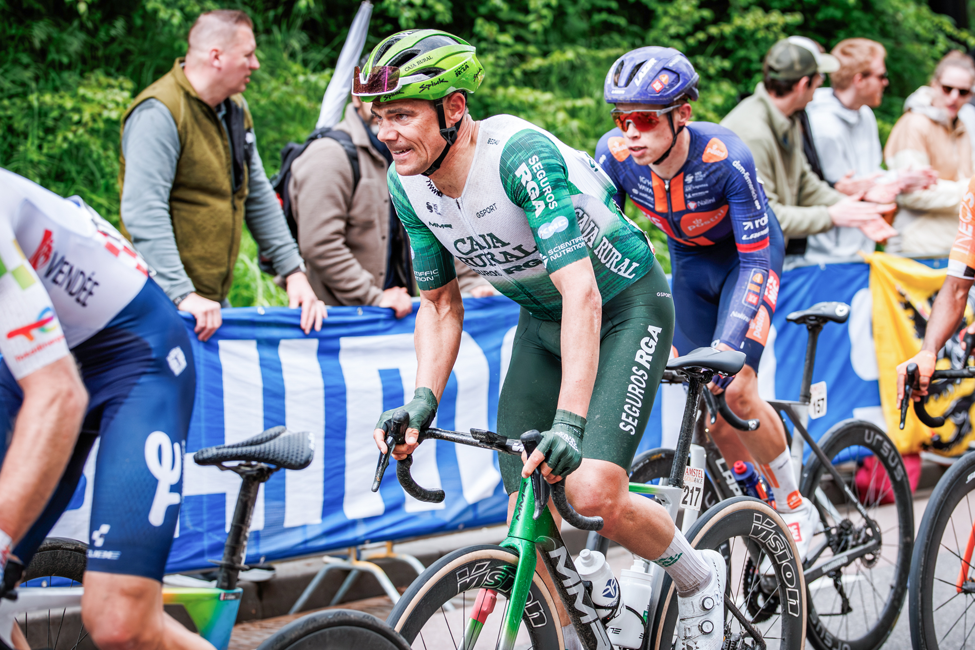 MAASTRICHT, NETHERLANDS - APRIL 19: Eduard Prades of Caja Rural Seguros RGA of Spain, Frank van den Broek of Team Picnic PostNL of Netherlands during the match between Amstel Gold Race v Men Elite at the Vrijhof on April 19, 2026 in Maastricht Netherlands (Photo by Pim Waslander/Soccrates/Getty Images)