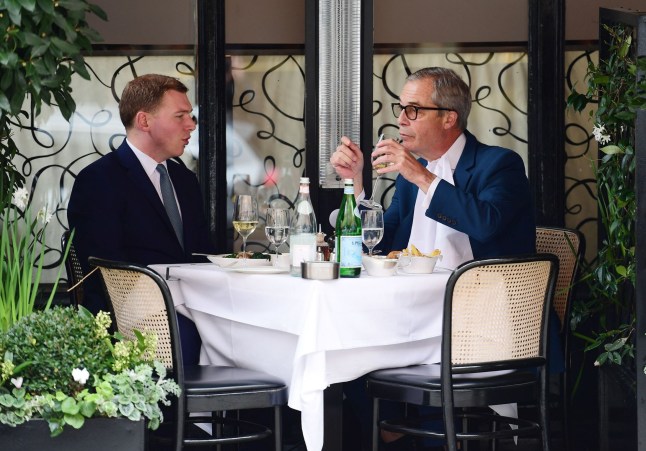 BGUK_2883596 - London, UNITED KINGDOM - Former UKIP leader now Honorary president of Reform UK Nigel Farage is seen enjoying a spot of lunch with his former senior advisor George Cottrell at Scott's Restaurant in London. Cottrell a political advisor and strategist who served as a treasurer and head of fundraising of the United Kingdom Independence Party and reportedly had served eight months in prison for alleged fraud back in 2017. The pair were seen enjoying some good conservation dining al fresco style, drinking and smoking at the table. Pictured: Nigel Farage - George Cottrell BACKGRID UK 4 APRIL 2024 UK: +44 208 344 2007 / uksales@backgrid.com USA: +1 310 798 9111 / usasales@backgrid.com *Pictures Containing Children Please Pixelate Face Prior To Publication*