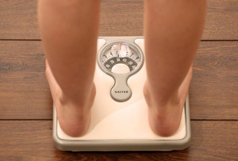 EMBARGOED TO 2330 WEDNESDAY JANUARY 7 Picture posed by a model. File photo dated 03/03/14 of someone using a set of weighing scales. People on fat loss jabs need ongoing support, researchers have said, after a major study found they put all the weight back on much faster than traditional dieters. Researchers from the University of Oxford discovered that people on drugs including semaglutide (Wegovy) and tirzepatide (Mounjaro) lose weight during treatment but, on average, regain it within 20 months of stopping the jabs. Issue date: Wednesday January 7, 2026. PA Photo. Photo credit should read: Chris Radburn/PA Wire