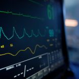 Vital signs monitor, digital and hospital with EKG machine, electronic and medical equipment to help. Emergency, stats and computer in ICU, clinic and healthcare, life and science with technology