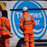LONDON, UNITED KINGDOM - 2025/09/01: Thames Water workers stand next to a van at a street repair site in Central London as reports state that Rachel Reeves, the Chancellor of the Exchequer, has called for a 