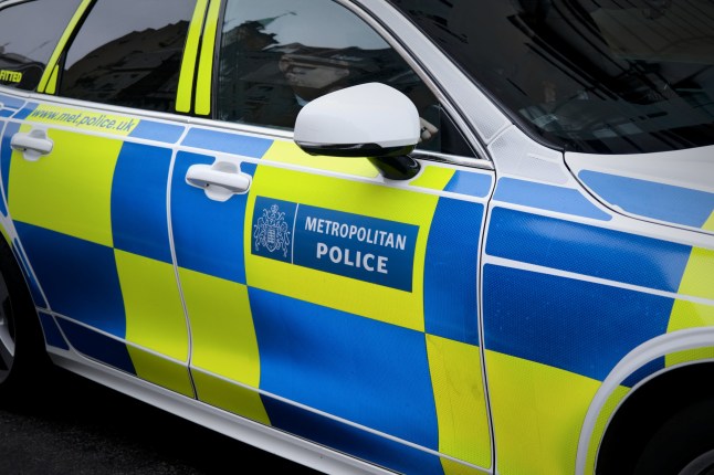 London, United Kingdom - 11 10 2024 : Side view of a London metropolitan police car. Close up of the side door.
