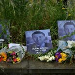 Floral tributes for Henry Nowak are pictured outside of Southampton Central Police Station in Southampton, southern England, on June 3, 2026. British police chiefs are reviewing anti-racism guidance following outrage over the treatment of a white student, who was handcuffed as he lay dying after being stabbed by a Sikh man, officials said June 3. (Photo by Ben STANSALL / AFP via Getty Images)