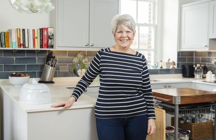 Louise Purchase in the kitchen of her one-bedroom flat