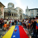 People light candles at a vigil in tribute to victims of Venezuela's deadly earthquakes, outside Valencia Cathedral, in Valencia, Spain, June 28, 2026. REUTERS/Eva Manez
