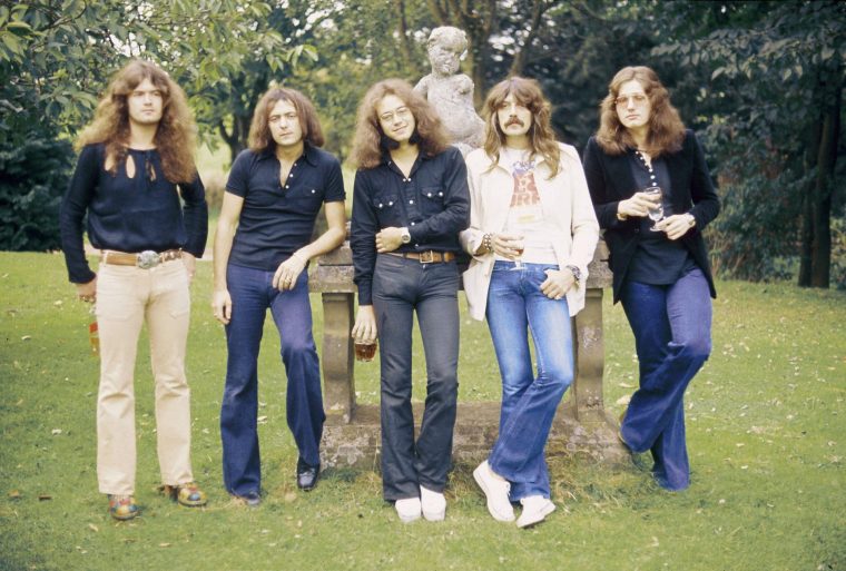 UNITED KINGDOM - SEPTEMBER 23: CLEARWELL CASTLE Photo of Jon LORD and Ian PAICE and Glenn HUGHES and DEEP PURPLE and David COVERDALE and Ritchie BLACKMORE, L-R: Glenn Hughes, Ritchie Blackmore, Ian Paice, Jon Lord, David Coverdale - posed, group shot launching third line up of band at Clearwell Castle in Wales (Photo by Fin Costello/Redferns)