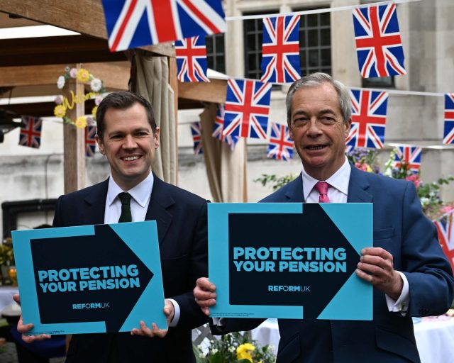 LONDON, UNITED KINGDOM - APRIL 02: Reform UK leader Nigel Farage (R) and Reform UK Treasury Spokesperson Robert Jenrick (L) pose for a photo during a press conference in London, United Kingdom on April 02, 2026. (Photo by Rasid Necati Aslim/Anadolu via Getty Images)