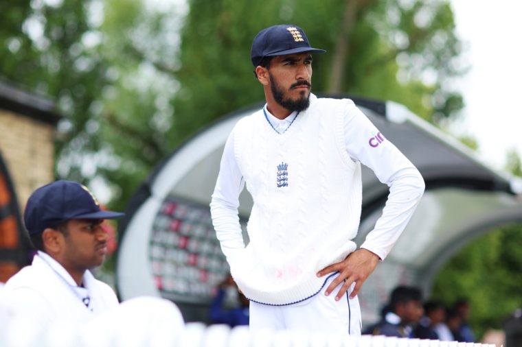 CHELTENHAM, ENGLAND - JULY 16: Hamza Shaikh, captain of England U-19 prepares to take to the field after a rain delay during Day One of the Youth Test match between England U-19 and Sri Lanka U-19 at College Ground on July 16, 2024 in Cheltenham, England. (Photo by Dan Istitene/Getty Images)