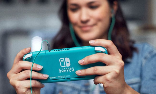 Nintendo Switch Lite being played by a woman