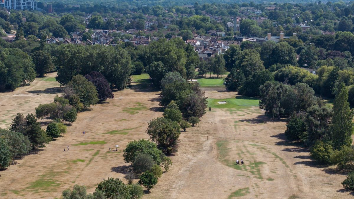 LONDON, ENGLAND - JULY 15: An aerial view of dried grass at Shortlands Golf club on July 15, 2026 in London, England. A new report from the Met Office, responsible for the country's weather forecasts, says that weather once regarded as extreme is now the new normal, showing that the hottest day of the year in the south of England is now typically 4.5C degrees warmer than it was between 1961 and 1990. The report also confirmed that 2025 was the warmest year on record since data started being collected in 1884. (Photo by Dan Kitwood/Getty Images)