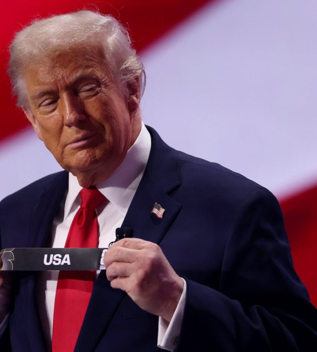 WASHINGTON, DC - DECEMBER 05: U.S. President Donald Trump draws out the card of United States during the FIFA World Cup 2026 Official Draw at John F. Kennedy Center for the Performing Arts on December 05, 2025 in Washington, DC. (Photo by Patrick Smith/Getty Images)