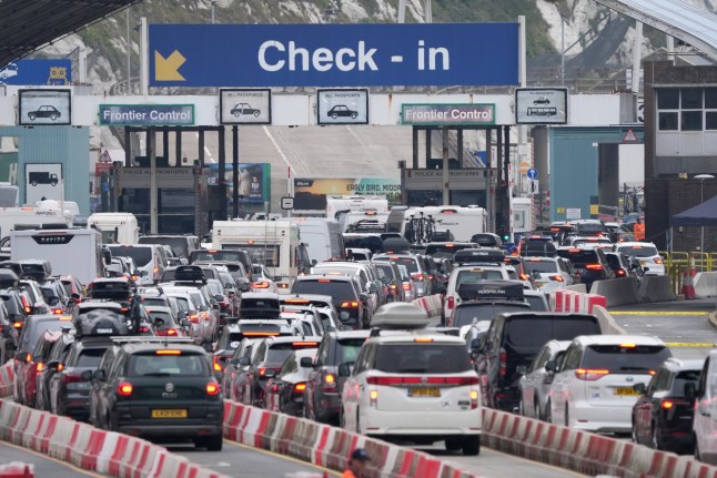A view of holiday traffic queueing to use the Port of Dover in Kent, as travellers make their way across the Channel at the start of the peak summer holiday travel period. UK officials are pressing France to