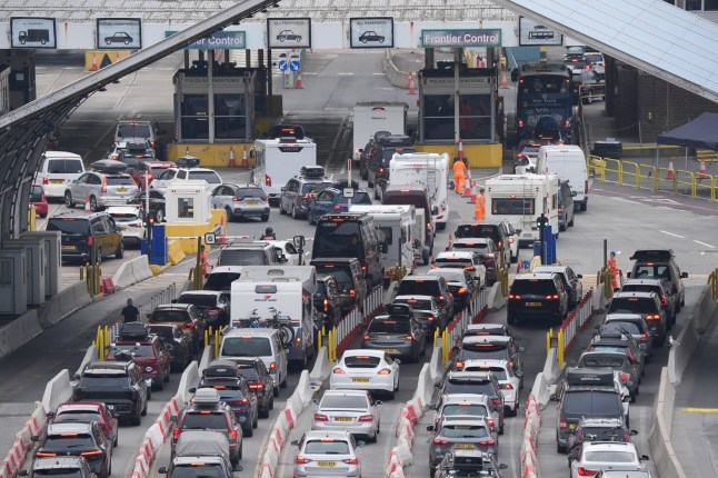 A view of holiday traffic queueing to use the Port of Dover in Kent, as travellers make their way across the Channel at the start of the peak summer holiday travel period. UK officials are pressing France to