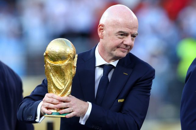 EAST RUTHERFORD, NEW JERSEY - JULY 19: FIFA President Gianni Infantino holds the trophy at full-time following the FIFA World Cup 2026 Final match between Spain and Argentina at New York New Jersey Stadium on July 19, 2026 in East Rutherford, New Jersey. (Photo by Chris Brunskill/Fantasista/Getty Images)