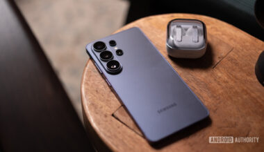 Samsung Galaxy S26 Ultra on table with earbuds