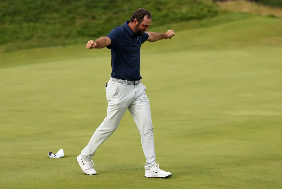 PORTRUSH, NORTHERN IRELAND - JULY 20: Scottie Scheffler of the United States celebrates victory on the 18th green after winning The 153rd Open Championship at Royal Portrush Golf Club on July 20, 2025 in Portrush, Northern Ireland. (Photo by Richard Heathcote/Getty Images)