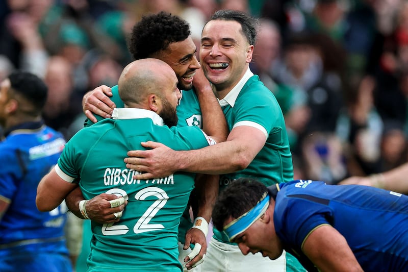 Ireland's Robert Baloucoune celebrates with Jamison Gibson-Park and James Lowe after scoring a try in the Six Nations match against Italy at the Aviva Stadium in February. Photograph: Inpho