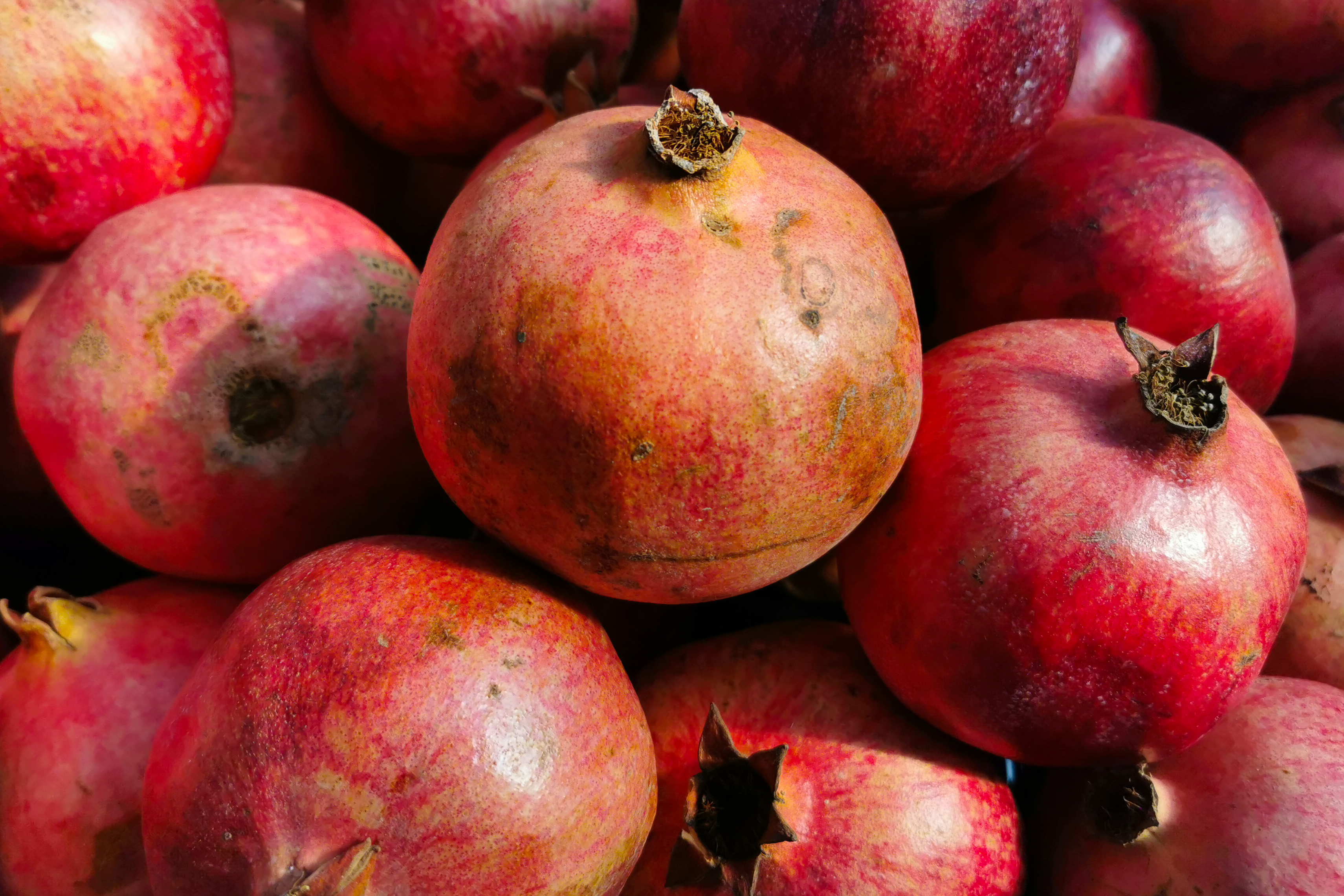 A stack of pomegranates