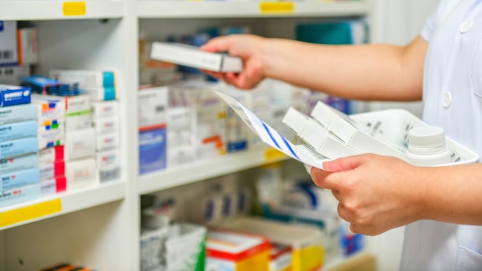 Pharmacist filling a prescription