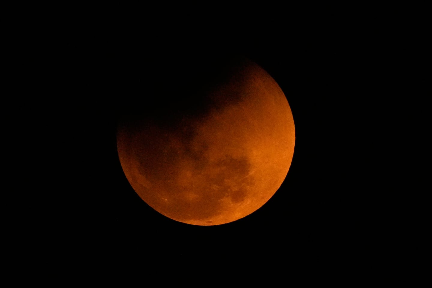 The "blood moon" is seen shortly after a total lunar eclipse from Guwahati, India, on March 3, 2026.