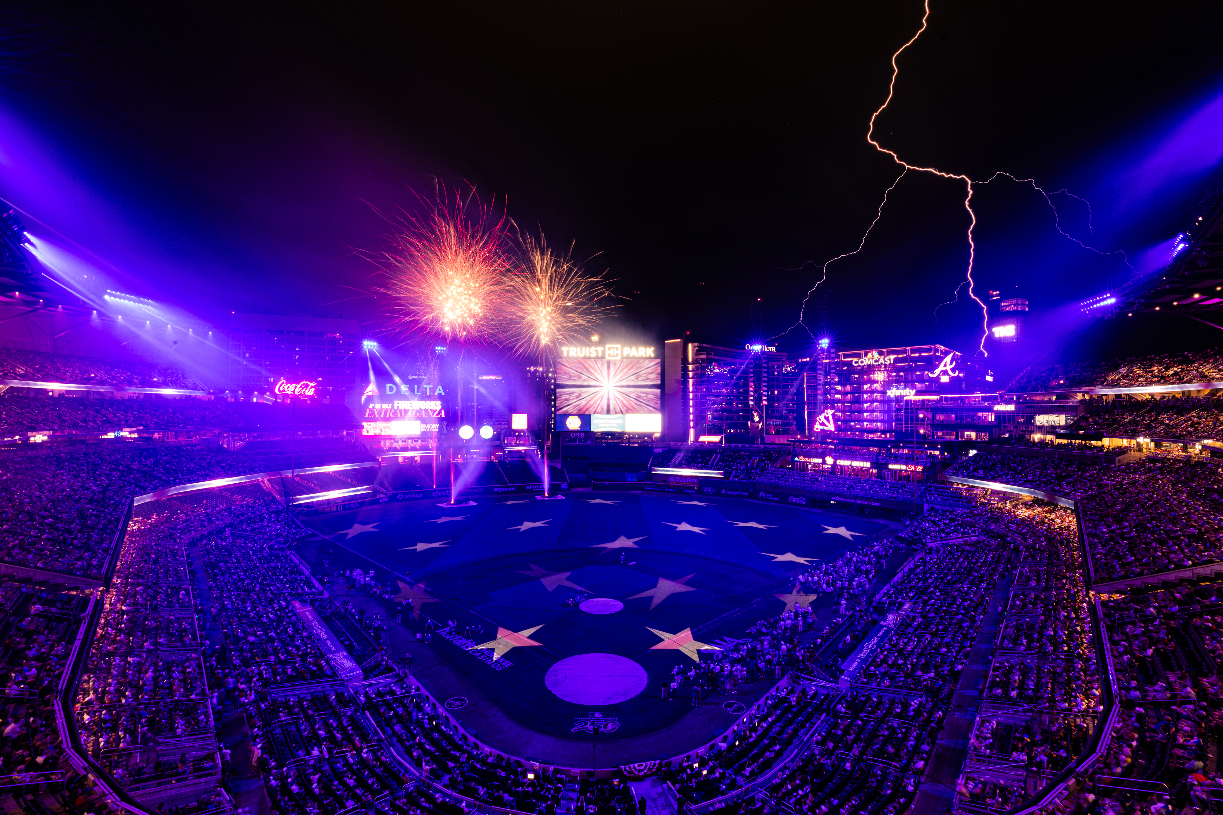 Lightning strikes during the postgame Fourth of July fireworks show after a 14-3 Atlanta Braves victory over the New York Mets at Truist Park on July 4, 2026 in Atlanta, Georgia