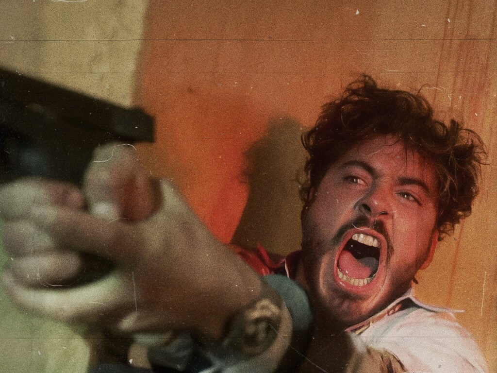 Robert Downey Jr as Wayne Gale in Natural Born Killers - 1994