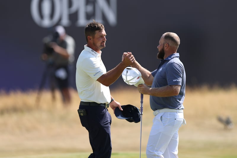 Bryson DeChambeau and Tyrrell Hatton at the end of day one of the Open Championship at Royal Birkdale. Photograph: Andrew Redington/Getty Images