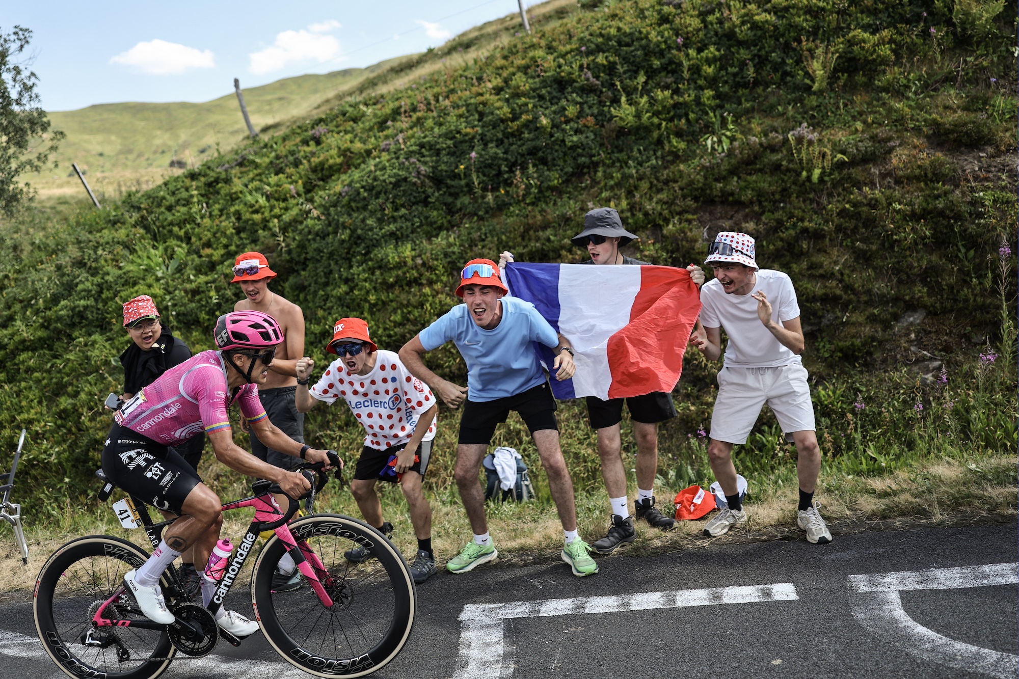 EF Education - EasyPost team's Ecuadorian rider Richard Carapaz cycles in a breakaway in the ascent of Puy Mary during the 10th stage of the 113th edition of the Tour de France cycling race, 166,6 km between Aurillac and Le Lioran in the Massif Central, on July 14, 2026. (Photo by Anne-Christine POUJOULAT / AFP)