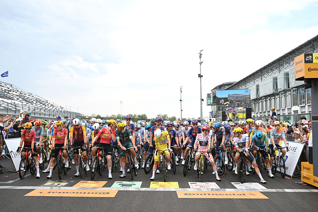 CIRCUIT NEVERS MAGNY-COURS, FRANCE - JULY 16: (L-R) Anthon Charmig of Denmark, Soren Waerenskjold of Norway and Team Uno-X Mobility, Mads Pedersen of Denmark and Team Lidl - Trek - Green Sprint Jersey, Tadej Pogacar of Slovenia and UAE Team Emirates - XRG - Yellow Leader Jersey, Jonas Vingegaard of Denmark and Team Visma | Lease a Bike - Polka Dot Mountain Jersey, Juan Ayuso of Spain and Team Lidl - Trek - White best Young Rider Jersey and a general view of the peloton prior to the 113th Tour de France 2026, Stage 12 a 179.1km stage from Circuit Nevers Magny-Cours to Chalon-sur-Saone / #UCIWT / on July 16, 2026 in Chalon-sur-Saone, France. (Photo by Dario Belingheri/Getty Images)