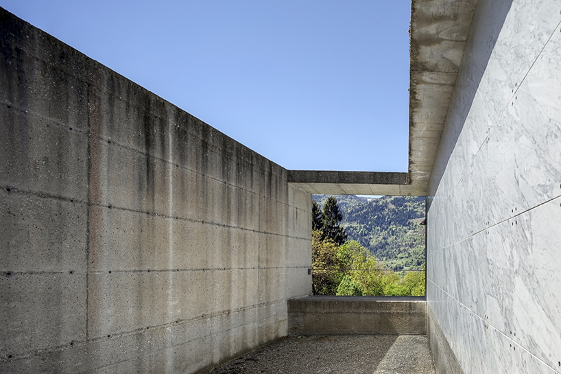 three cemeteries emerge between stone walls and mountain horizons in the carnic alps - 3