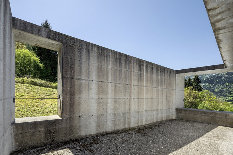 three cemeteries emerge between stone walls and mountain horizons in the carnic alps - 4