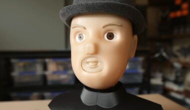 A screenshot from a YouTube video showing a lip-syncing robot