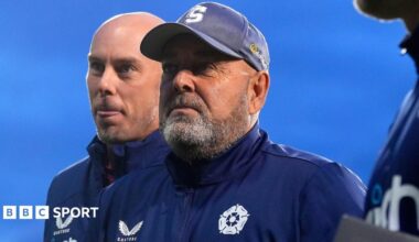 Darren Lehmann, wearing a blue jacket with Northamptonshire's club badge on and a blue hat with the S logo to represent the Steelbacks nickname.