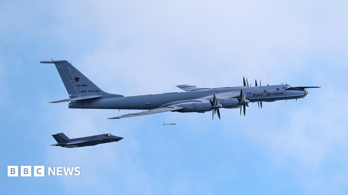 Handout photo issued by Ministry of Defence of a F-35B fighter launched from HMS Prince of Wales intercepting a Russian Tupolev Tu-142 maritime reconnaissance and anti-submarine warfare (ASW) aircraft.