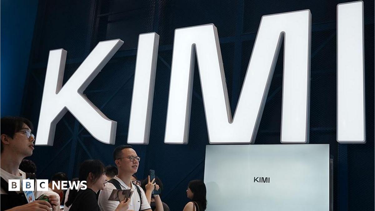 Visitors at a trade show in Shanghai visit a booth with the Kimi sign displayed in large block letters