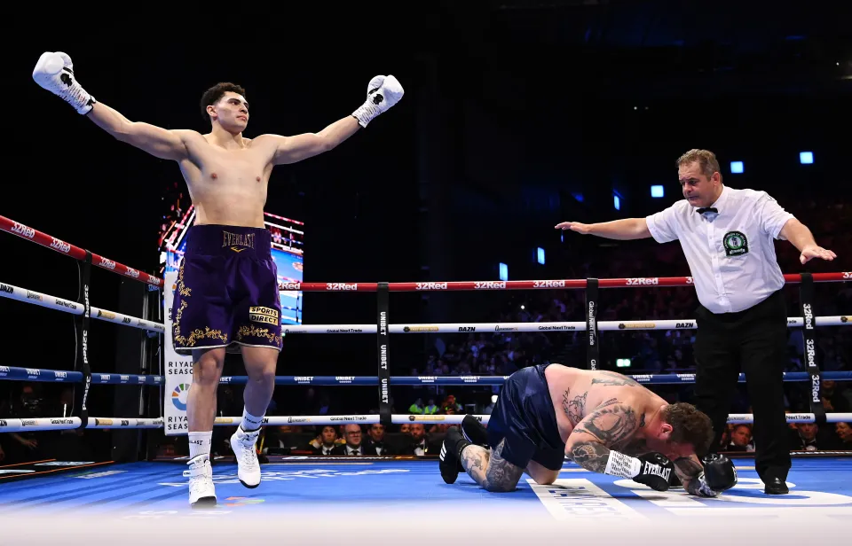 Adam Olaniyan reacts to knocking down Jan Bezouska during a heavyweight fight