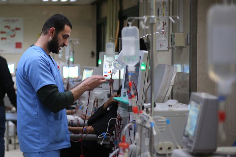 A Palestinian doctor checks a drip at the dialysis treatment centre at Al-Aqsa Martyrs Hospital, in Deir al-Balah in the central Gaza Strip, on February 1, 2026.