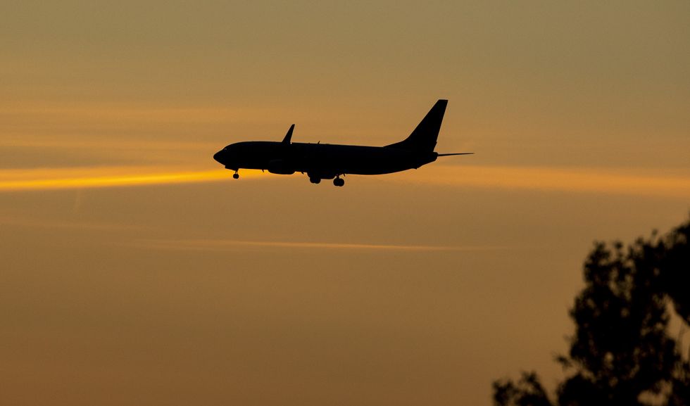 An aeroplane travelling through the sky