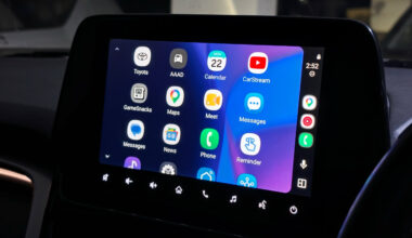 Android Auto's app launcher showcasing apps like Google Maps, CarStream, phone, and more