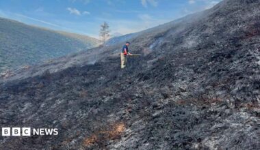 A large fire is seen on a mountainside