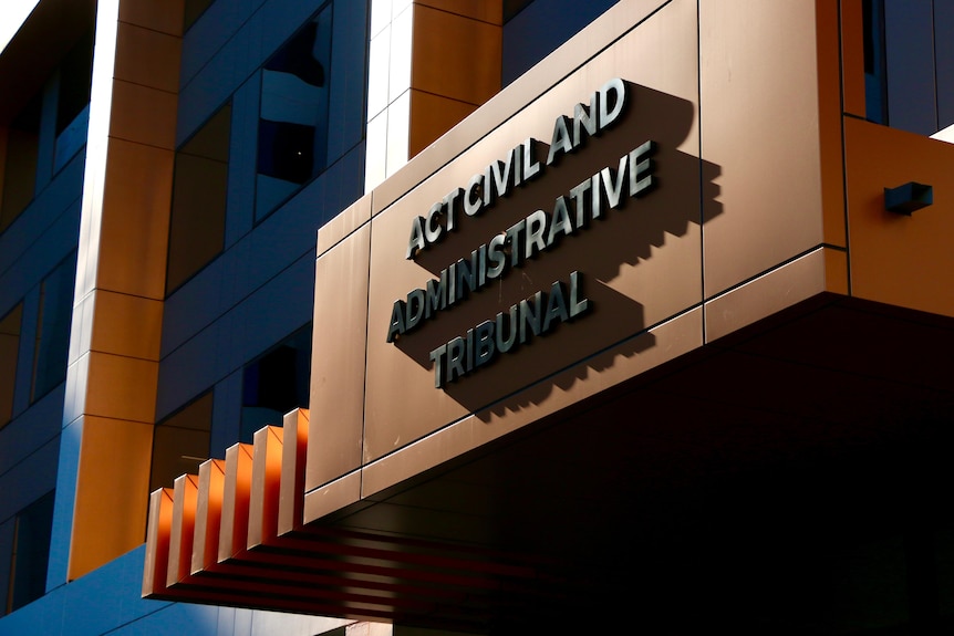 A building sign that reads 'ACT Civil and Administrative Tribunal'.