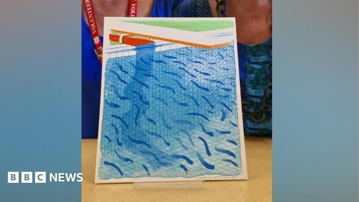 A colourful blue print of a swimming pool, with a faint pencilled signature of David Hockney in the bottom right hand side
