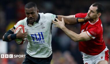 Jiuta Wainiqolo of Fiji hands off Wales' Tomos Williams