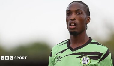 Laurent Mendy in Forest Green's lime green and black kit
