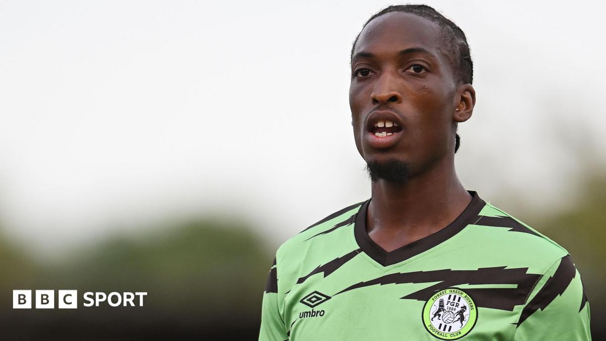 Laurent Mendy in Forest Green's lime green and black kit