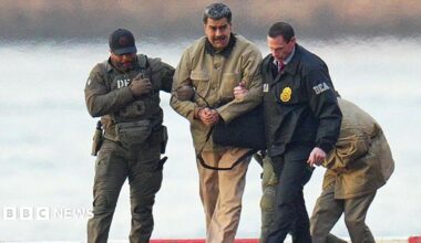Nicolas Maduro is seen in handcuffs after landing at a Manhattan helipad, escorted by heavily armed Federal agents as they make their way into an armored car en route to a Federal courthouse in Manhattan on 5 January 2026 in New York City.