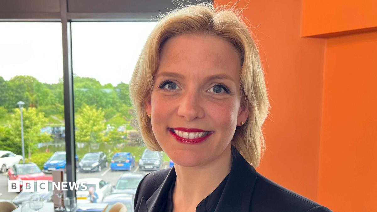 South Derbyshire MP Samantha Niblett, who has short blonde hair, smiles at the camera.
