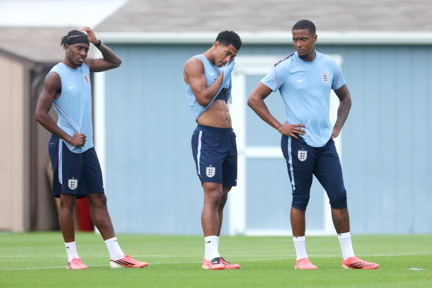 From left, Noni Madueke, Jude Bellingham and Ezri Konsa of England take a break during a training session in Kansas City, Kansas. Fans and players alike are encouraged to stay hydrated during World Cup matches.