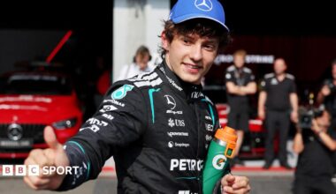 Mercedes' Kimi Antonelli gives the thumbs-up signal in the pit lane after taking pole position for the Belgian Grand Prix