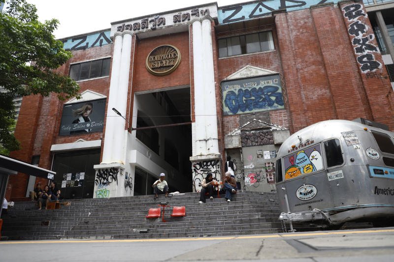 Tourists and locals visit the Hollywood Street building in Ratchathewi district, Bangkok, in July 2026. The building has been closed for renovation. (Photo: Nutthawat Wichieanbut)